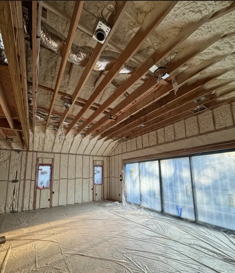 Interior walls and ceiling insulated with spray foam during new construction in Bridgeview